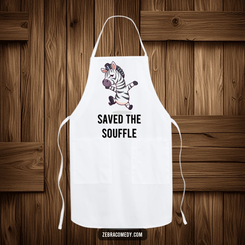 Funny zebra character in a mid-air surprise pose after tripping, on a kitchen apron for humorous cooking.