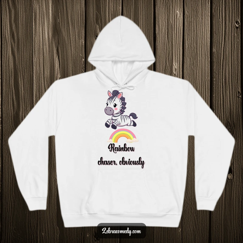 Funny Zebra Hoodie: A comically happy zebra character jumping gracefully over a small rainbow, bringing whimsical vibes.