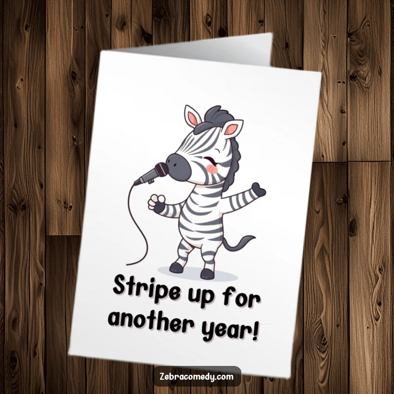 Funny free printable birthday card: A zebra in striped socks joyfully sings into a microphone, celebrating with a happy jig.