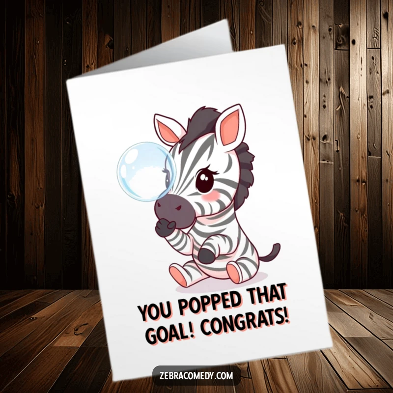 Funny Free Printable Congratulations Card: A charming zebra batting at a shiny bubble with its small paws, symbolizing playful success.