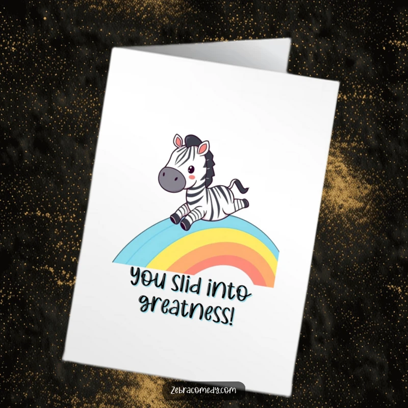 Funny Free Printable Congratulations Card: A happy zebra comically sliding down a vibrant striped rainbow, pure celebration.