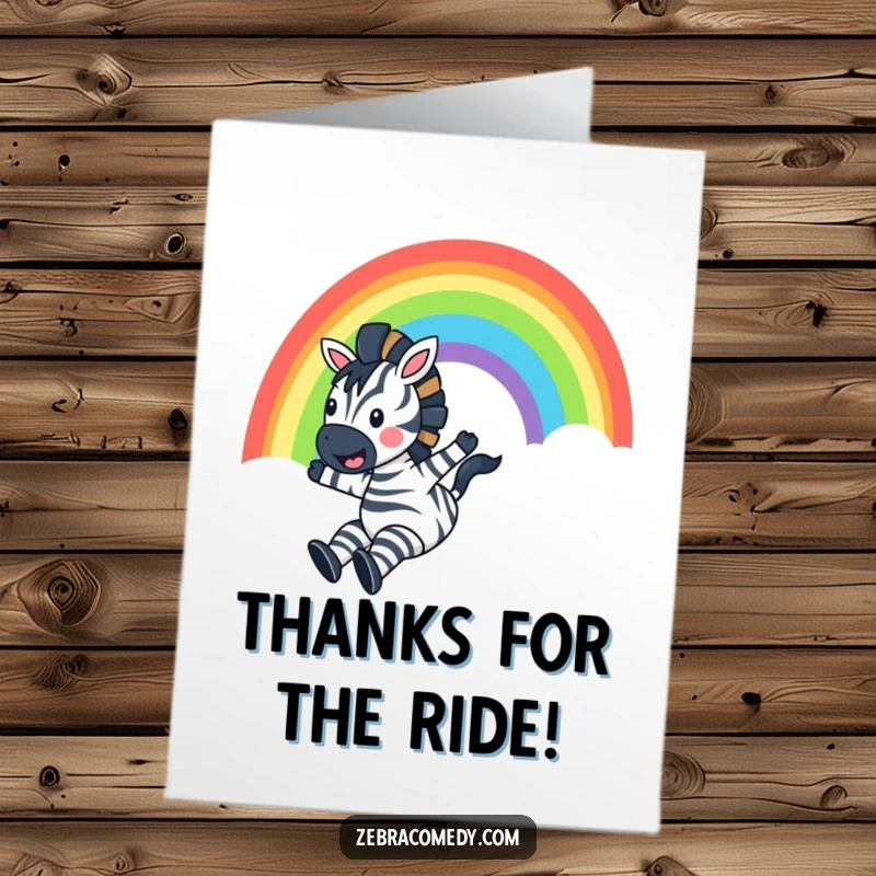 Funny Free Printable Thank You Card: A zebra slides with glee down a magnificent rainbow, a picture of pure joy.
