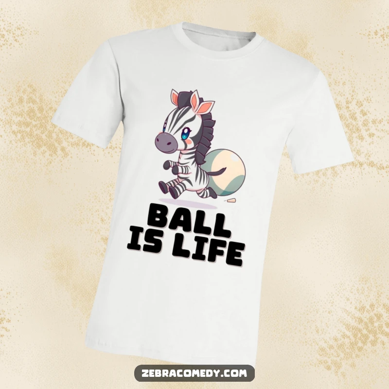 Funny T-Shirt of a zebra character with bright, twinkling eyes, joyfully chasing a large, bouncing ball, symbolizing playful pursuit.