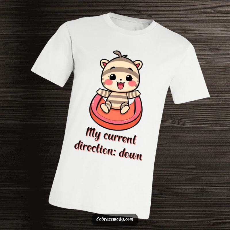 Funny t-shirt with a smiling striped character impossibly sliding down a bright rainbow, expressing ultimate joy and a sense of playful freedom.