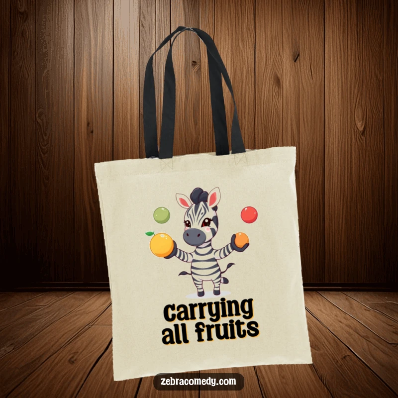 Funny zebra tote bag depicting a zebra playfully juggling three colorful fruits with excitement, perfect for carrying essentials with a fun flair.