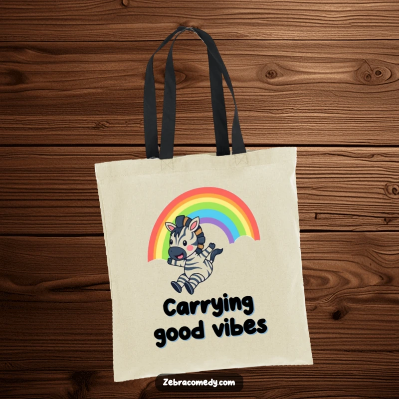 Funny Zebra Tote Bag: A happy zebra slides down a colorful rainbow, arms outstretched, embodying pure joy and adventure for carrying your items.