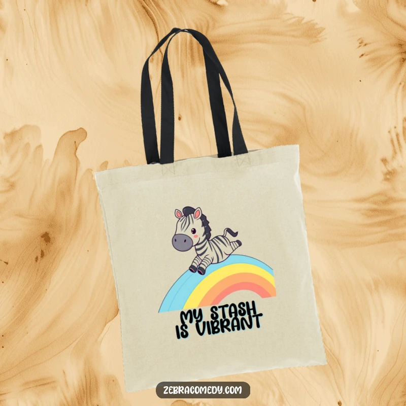 Funny Zebra Tote Bag: A zebra sliding down a rainbow with a wide grin, a humorous and practical carry-all.